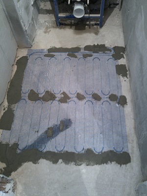 Монтаж теплого пола в туалете